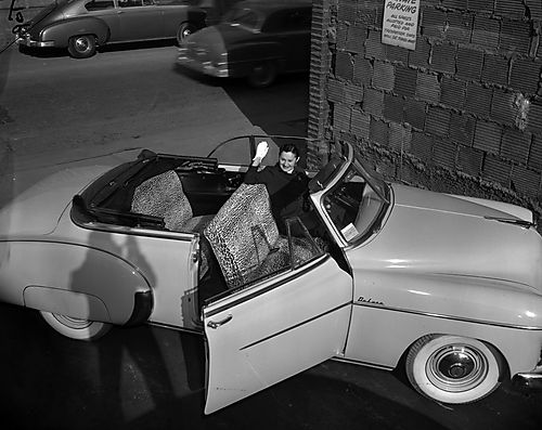 Woman in Convertible