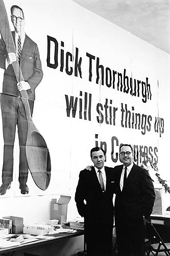 Thornburgh and supporter in front of campaign billboard: Dick Thornburgh will stir things up in Congress