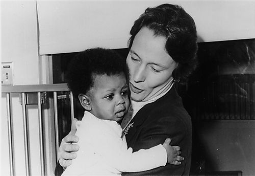 Ginny Thornburgh holding baby at Children's Hospital
