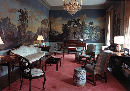 Drawing Room decorated with antique French wallpaper panels entitled "Les Incas" which depict the invasion of Peru by Pizarro (Hand painted by Joseph DuFours, Paris, 1826)