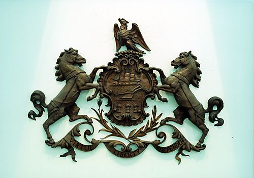 Carved mahogany Pennsylvania Coat of Arms which is the focus of the State Dining Room, discovered among office furnishings once used by Governor Samuel Pennypacker