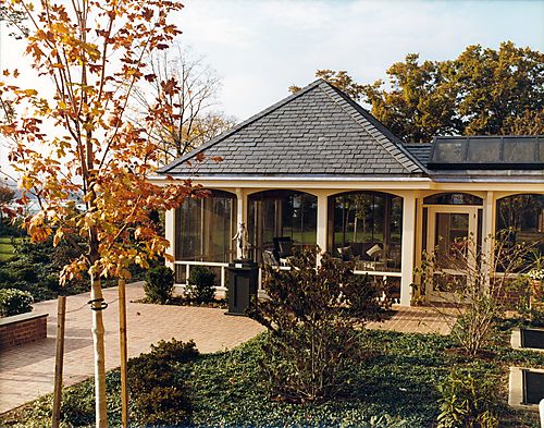 View one of the gardens and screened porch