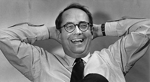 Informal photograph of Governor laughing