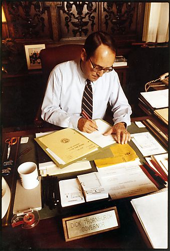 Governor at his desk in Governor's Office
