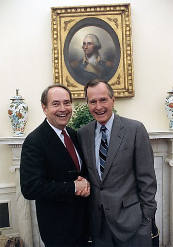 Thornburgh and President Bush informally greeting each other in the Oval Office