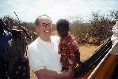 Thornburgh with a Somalian child in a Kenyan refugee camp