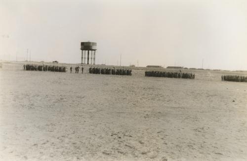 Large Groups of Soldiers Near Water Tower