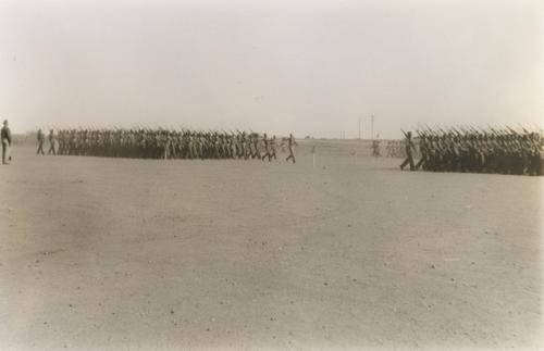 Two Groups of Soldiers with Rifles