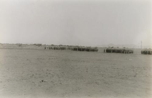 Distant View of Soldiers and Mountains