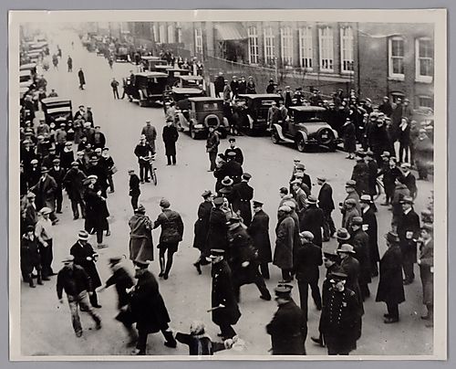 Police Dispersing Communist Agitators in Front of New Bedford Mill