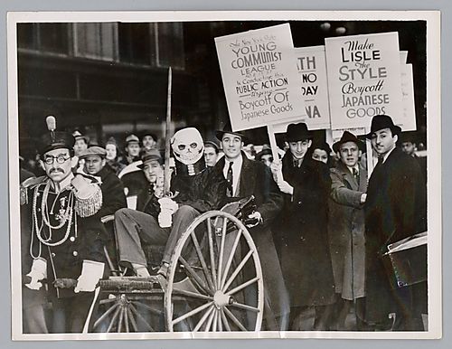 Photograph of Men from The New York State Young Communist League Boycotting Japanese Goods