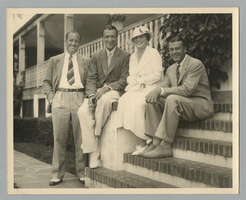 Rinehart family portrait - Mary Roberts Rinehart on steps with adult sons