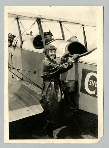Mary Roberts Rinehart with stunt plane