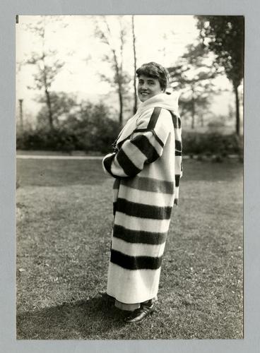 Mary Roberts Rinehart outdoors in blanket coat