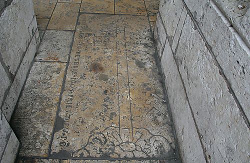 Tomb slab in the floor of the North Porch