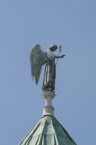 Statue of angel at southern tip of roof