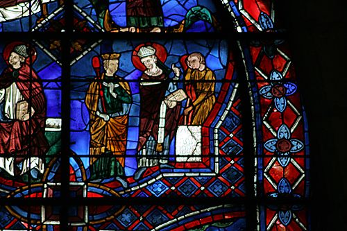 20: Rémi shows King Clovis a burning man  (idol?)