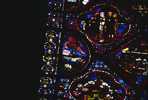 28: A crow pecks at the eyes of a corpse