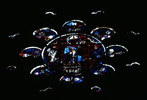 Thomas Becket with unidentified male and female (?) donors