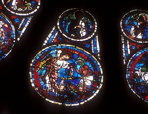 32: St. Michael weighing souls