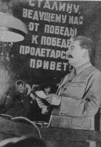[Stalin delivers a speech to party delegates]