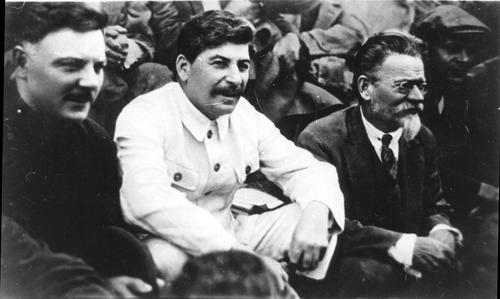 [K. E. Voroshilov, I. V. Stalin, and M. I. Kalinin at the First All Union Congress of Outstanding Kolkhoz Workers in Moscow]