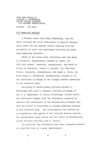 A federal grand jury returned the first indictment under the new federal statute dealing with the corruption of local law enforcement officials by syndicated gambling interests