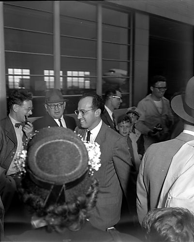 Crowd Greets Jonas Salk at Airport